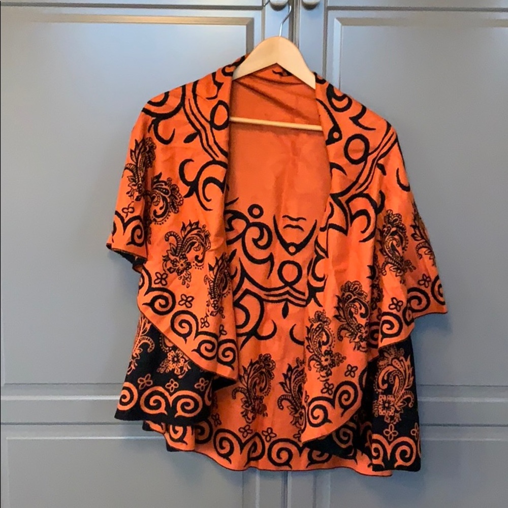 Women’s orange and black poncho sweater, wool